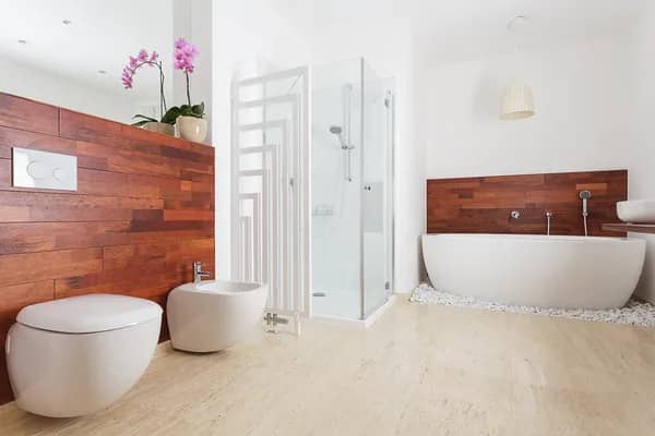 Sustainable bathroom design with water-saving fixtures, reclaimed materials, and eco-friendly features